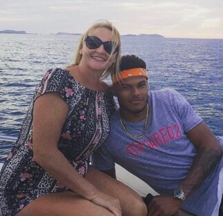 Tyrone Mings with his mom, Dawn Johnson.